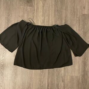 Black tube top with sling arm sleeve